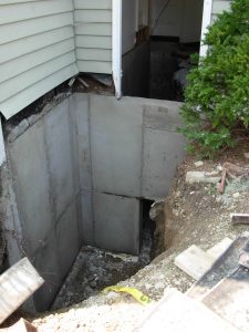 Basement Wall Replacement -- Finished foundation corner