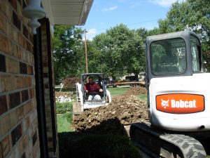 Excavating -- Cleaning up with a skid-steer