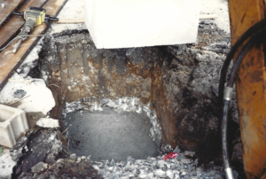 Foundations -- Hole with concrete on bedrock